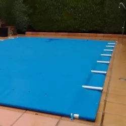 Cobertor deslizante de seguridad para piscinas de 9 x 5 m